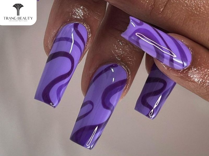 Mẫu nail đẹp cho móng tay dài màu tím duyên dáng