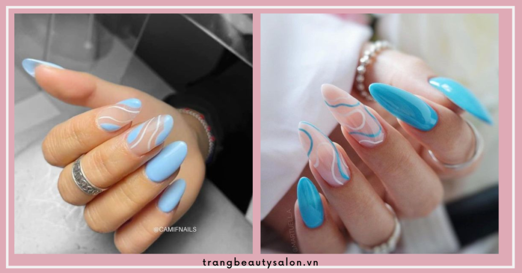 Nail xanh dương nhạt hướng cổ điển với họa tiết gợn sóng cách điệu.