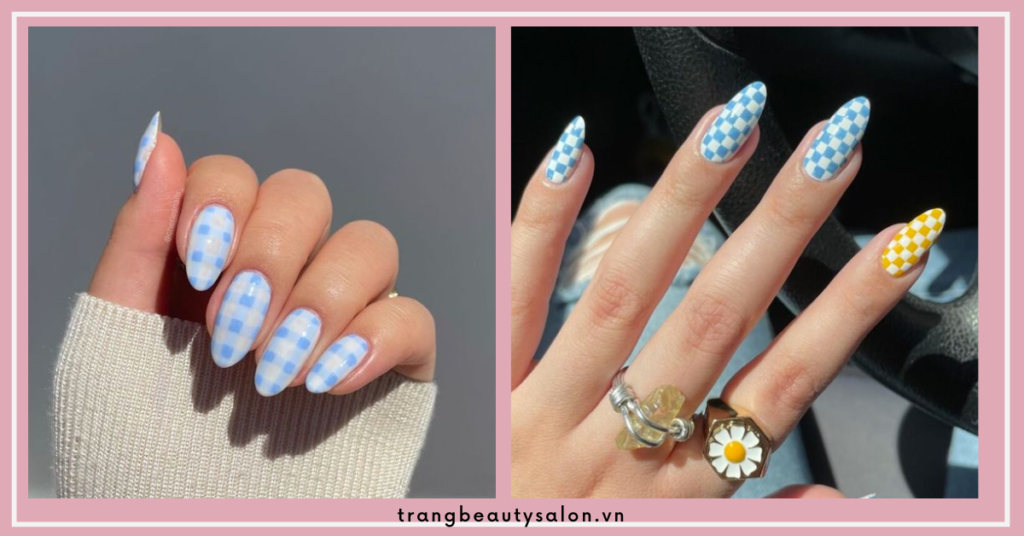 Mẫu họa tiết caro là một trong những thiết kế mang nét đẹp cổ điển. Màu nail xanh dương nhạt trong trẻo, trẻ trung vô cùng bắt mắt.